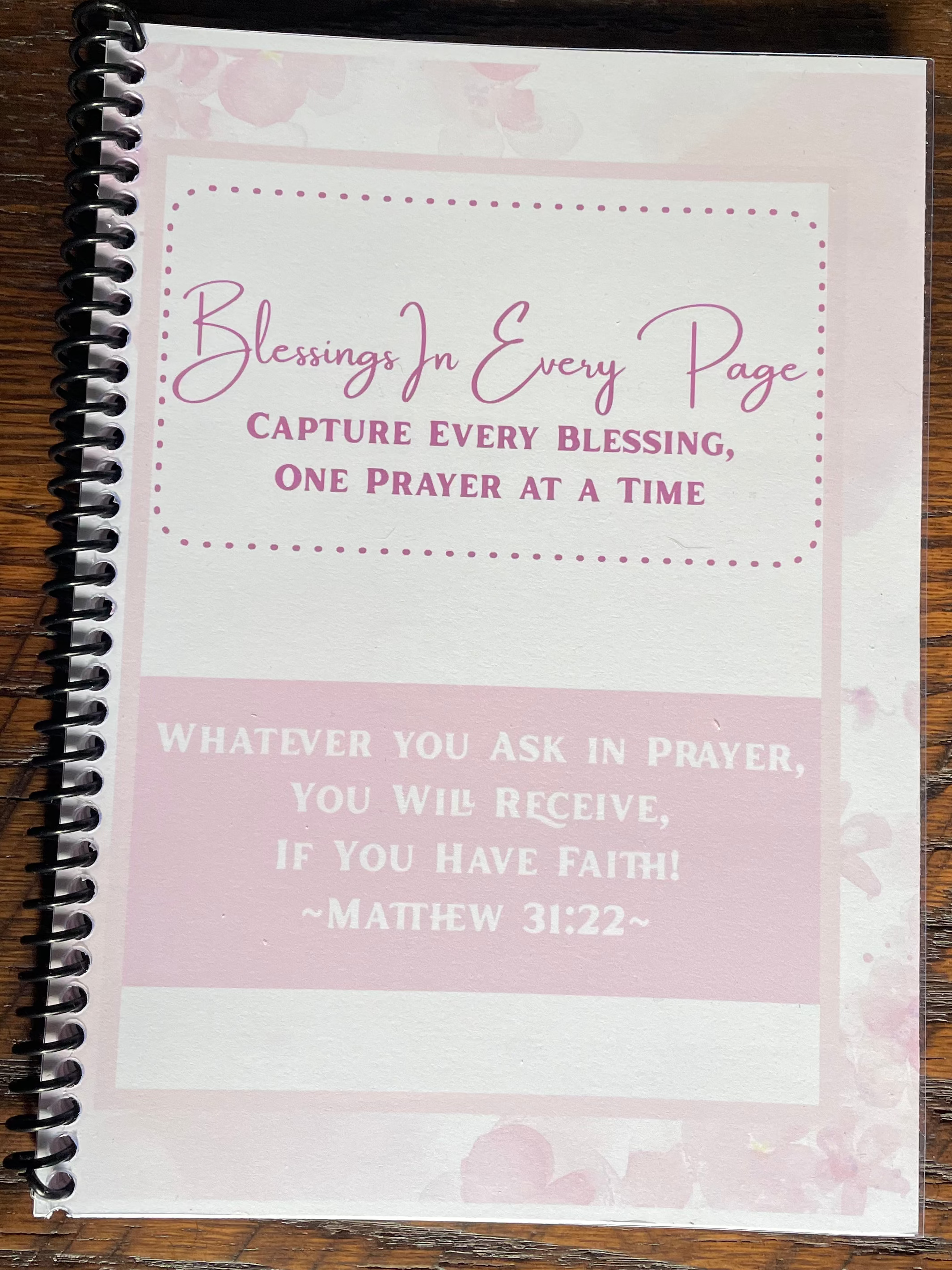 Prayer Organizational Journal with inspirational text on a wooden surface
